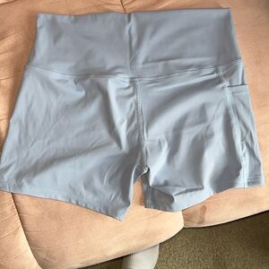 Medium nylon baby blue biker/workout shorts with pockets